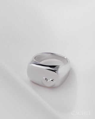 Chérie rhodium-plated heart ring flat lay, size 9