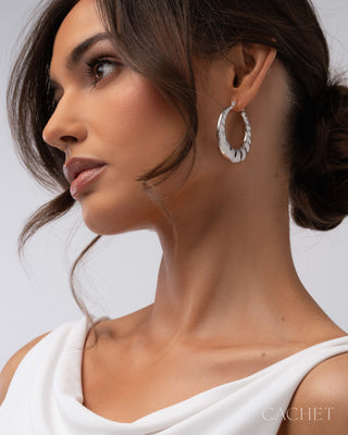 Bruyante - Rhodium-Plated Textured Hoop Earring - CACHET by Paparazzi