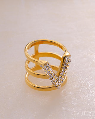 Affiné gold-plated rhinestone ring flat lay size 9