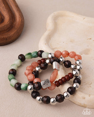 Tailored Team beaded bracelets modeled